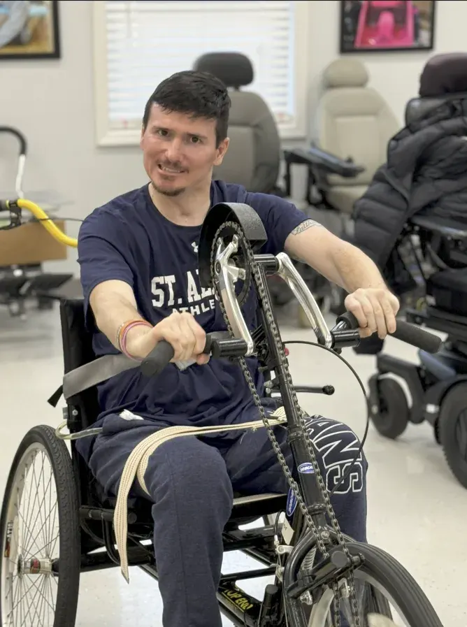Taylor on an adaptive bike