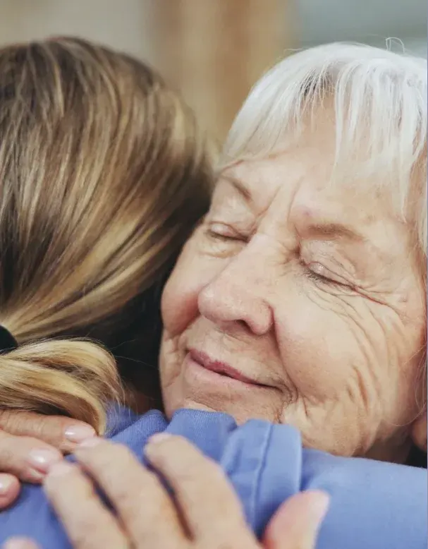 Two people sharing a warm embrace
