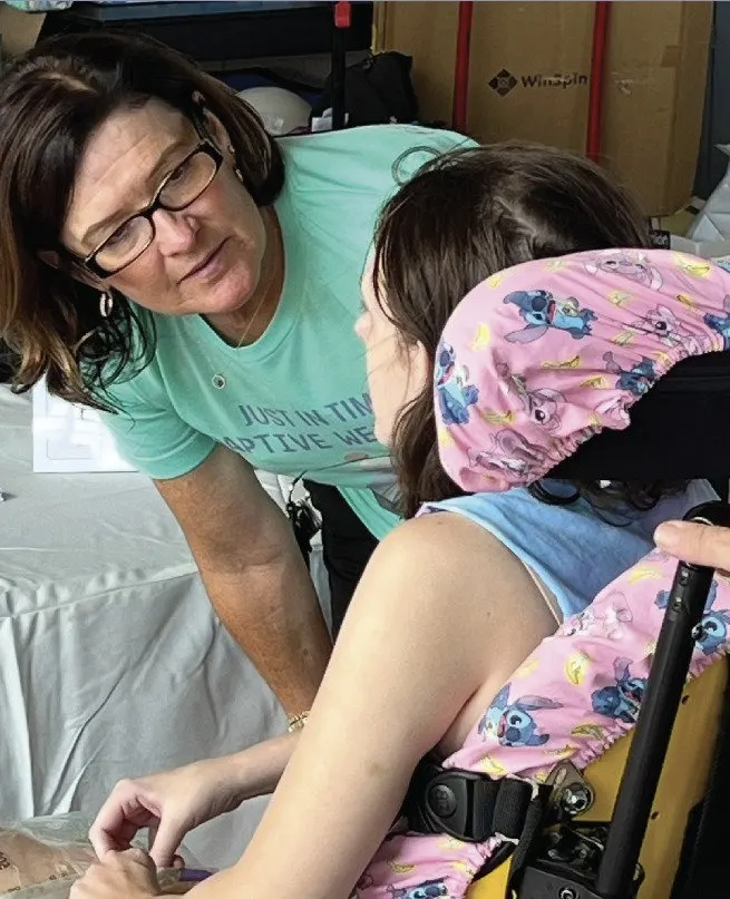 Dana Spradling coaching a family member